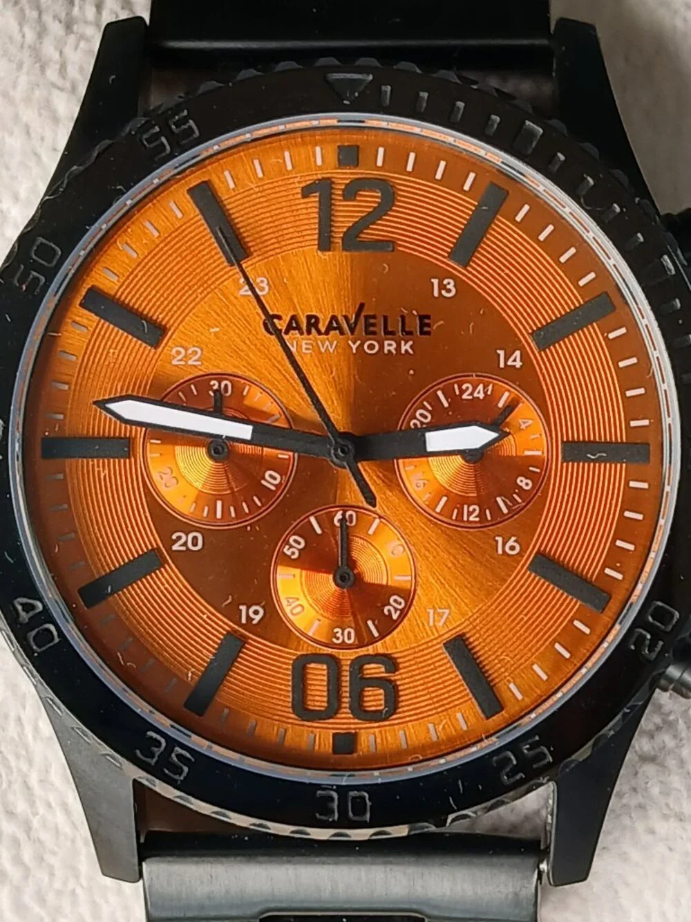 Caravelle Watch - Orange Face w/Black Steel Band